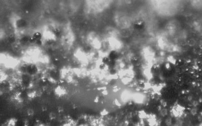 Ejection of liquid particle.