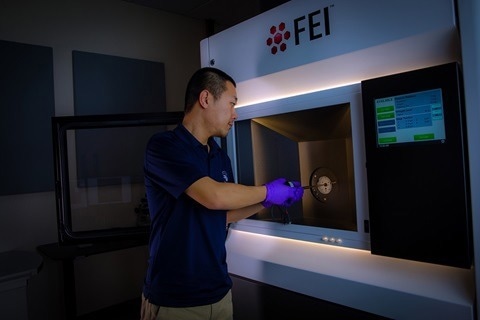 Picture showing Mr. Dian Li, a PhD student of Dr. Yufeng Zheng at UNR, working on Talos F200S S/TEM.