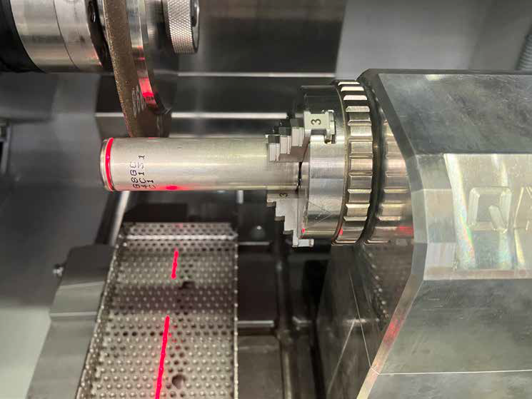 How to clamp the LIB in rotational clamping tool to cut the cap and take the jelly roll out