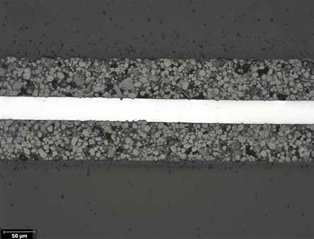Aluminum foil coated on both sides with metal-oxide particles.