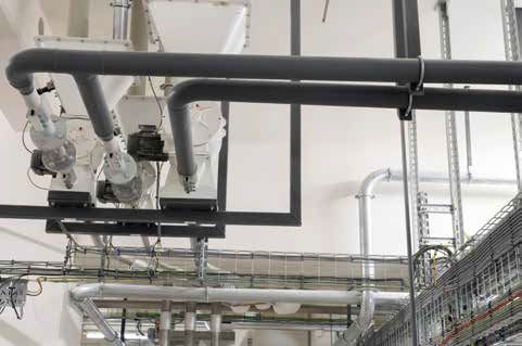 Downstream of every pipe is a blower, some leading from the ground floor to the eighth floor. The grey pipes supply the raw gas. As soon as food is involved, stainless steel tubes are used (silver).