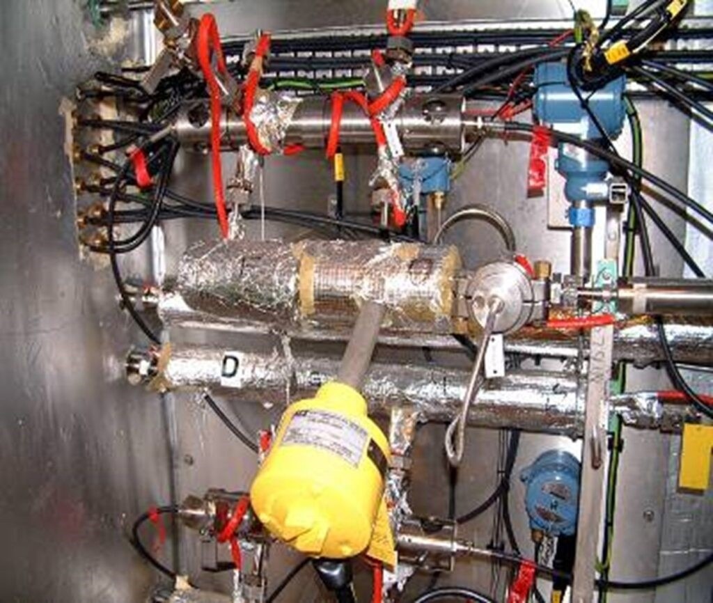 Installation configuration of a Specac Typhoon gas-phase process cell at the top of an image on a chemical plant. Installation configuration of a Specac Typhoon gas-phase process cell at the top of an image on a chemical plant.