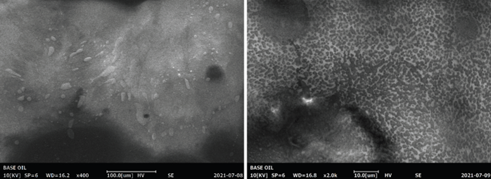 Crystallization of paraffins inside a lubricating oil with Pour Point -12 °C. SEM observation of the sample at 400x and 2000x magnification, at a temperature of -20 °C