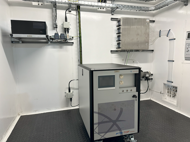 PTR-TOF real-time VOC analyzer (bottom), Sample Handling System (upper right) in the air conditioned shelter.