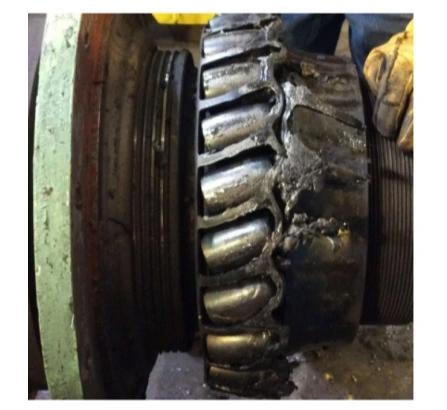 Queen roll bearing after failure due to inadequate lubrication between cage and rollers.