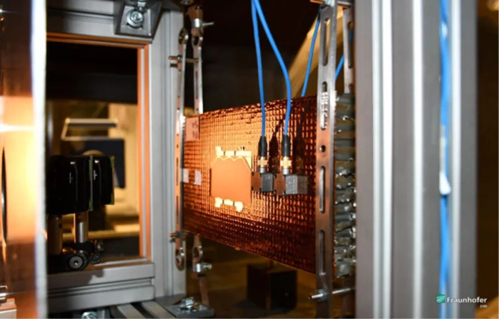 Front of the photovoltaic element aligned in the target chamber. The impact pulse is recorded by vibrometers on the left-hand side of the element and by piezoceramic acceleration and ultrasonic sensors on the right-hand side
