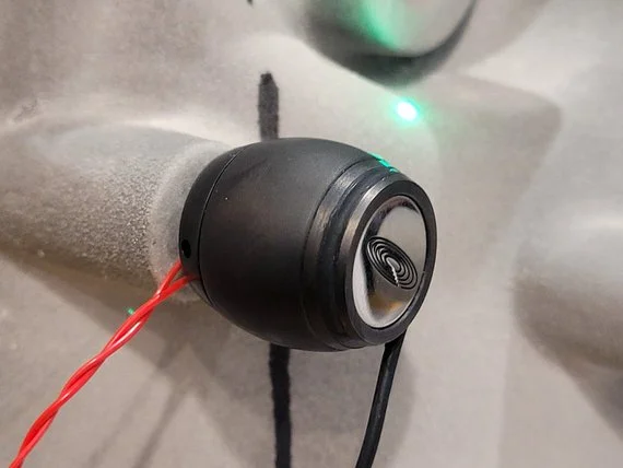 The Qlws inertial shaker mounted to the DUT.