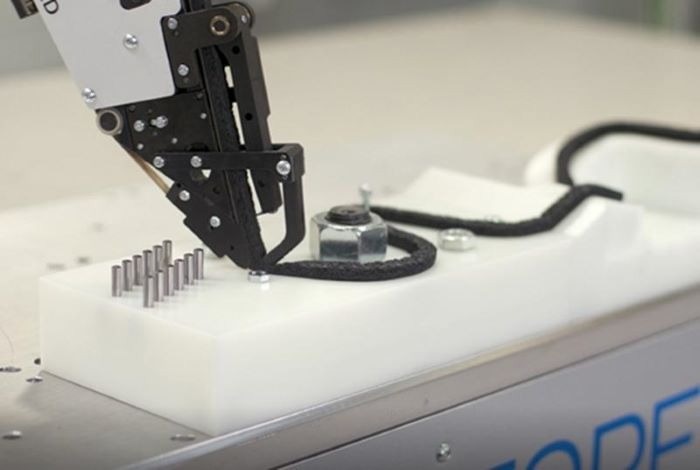 A depiction of a robot applying automated foam