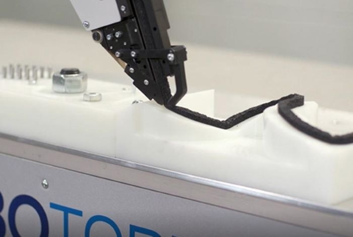 Automated foam application via robot