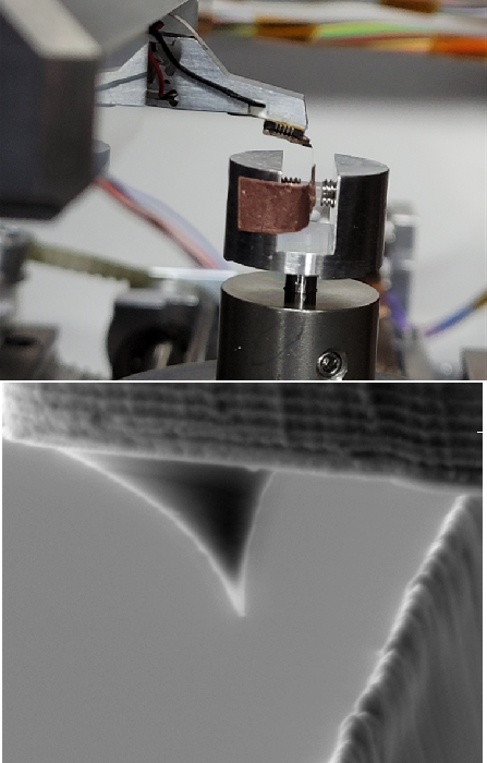 (Top) FusionScope scanner and razor blade sample inside vacuum chamber. (Bottom) SEM image of the cantilever tip a few micrometers above the razor blade. The tip geometry as well as the topography of the razor blade can be seen