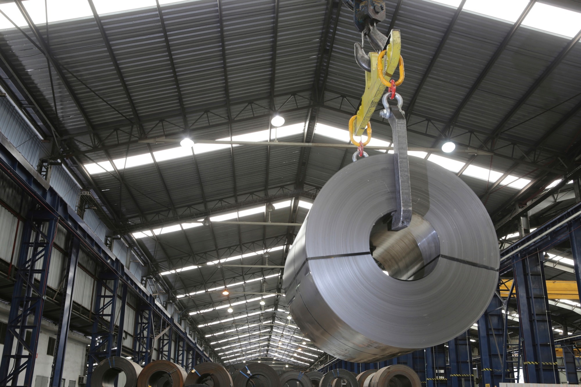 Cold rolled steel coil at storage area in steel industry plant.