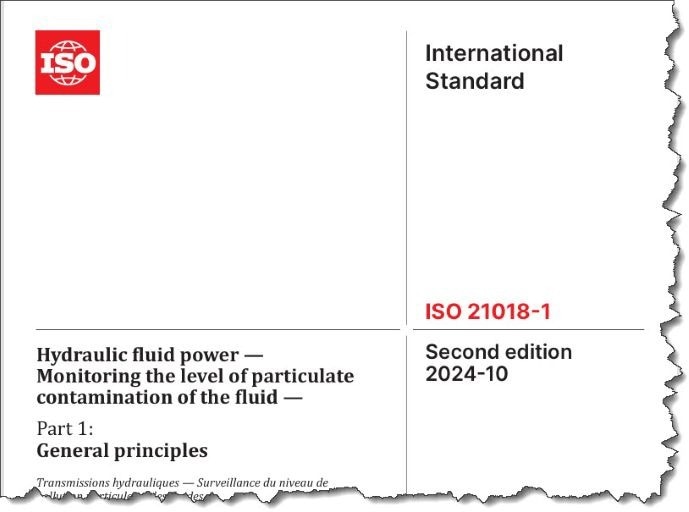 What are some of the most common challenges related to contaminant monitoring in hydraulic fluids?