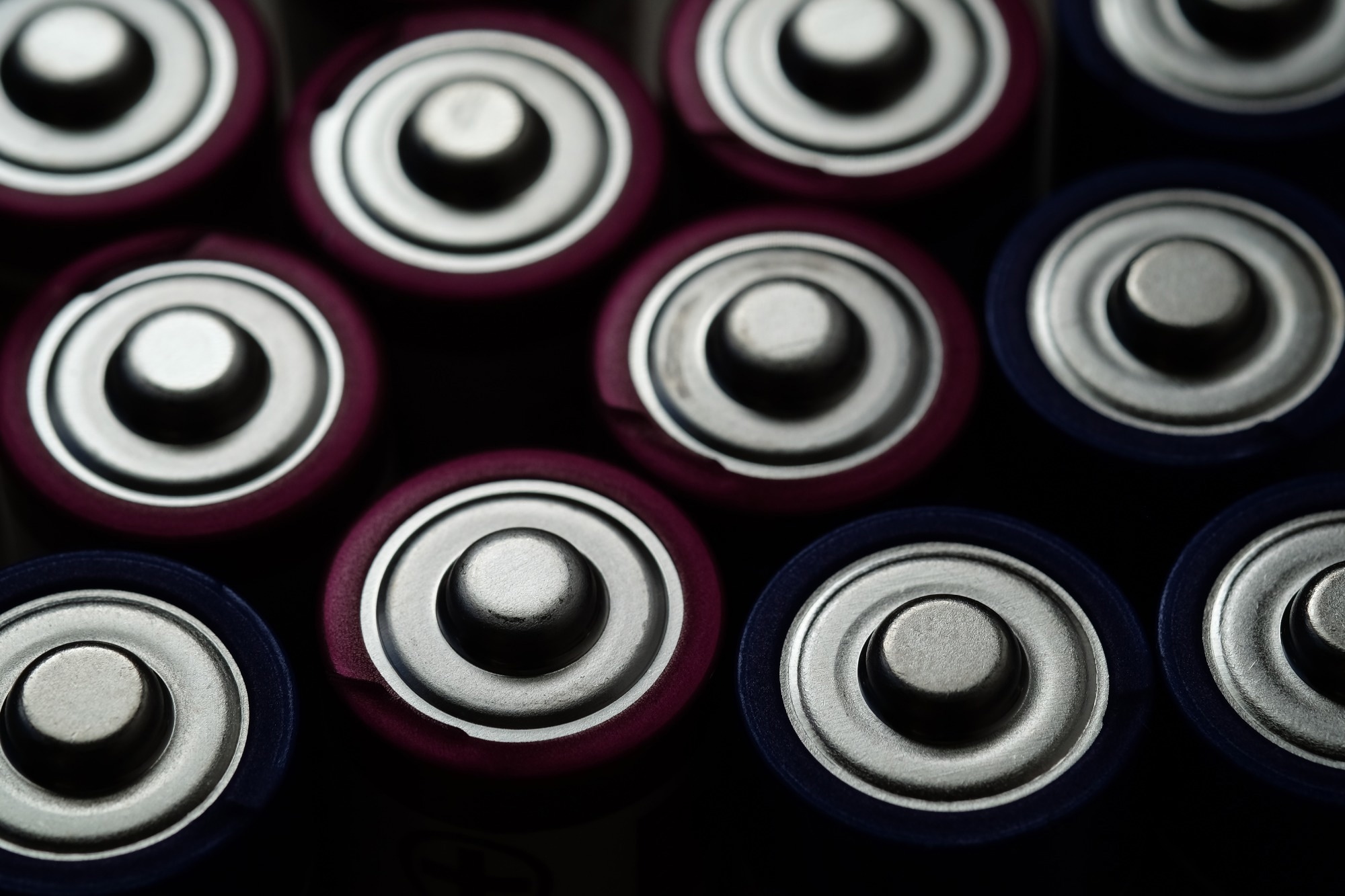 anode of dry cell battery background in dark tone