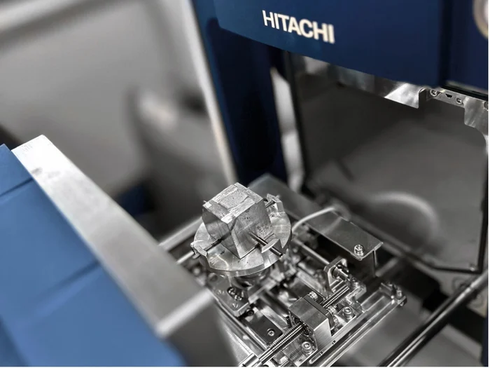 The sample stage is pulled completely out of the chamber for easy sample changes