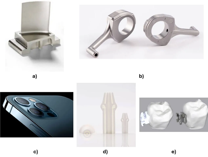 Examples of parts processed through indirect methods using thermoplastic binders [1, 6]: a) Compressor blades for the Rolls-Royce Pearl 15 aircraft engine. b) Oil spray cooler. c) Camera protector. d) Alumina nozzle. e) Dental brackets