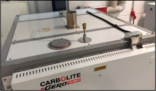 Top of the oven showing the cooling duct, outlet valve & access port