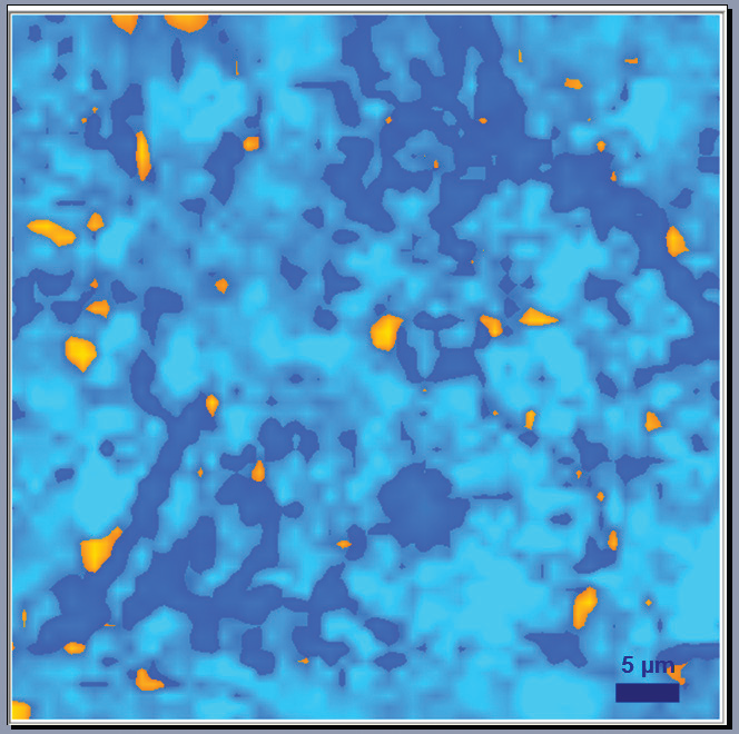 Raman image graphite anode after a cycling process: blue zones show graphite with a relatively low level of defects; and dark blue show graphite with higher level of defects; and orange zones correspond to presence of a binder (resin).