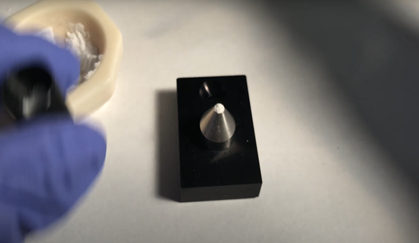 Image showing a correctly packed sample in the Microsample Cup of the Harrick Praying Mantis Diffuse Reflection Accessory