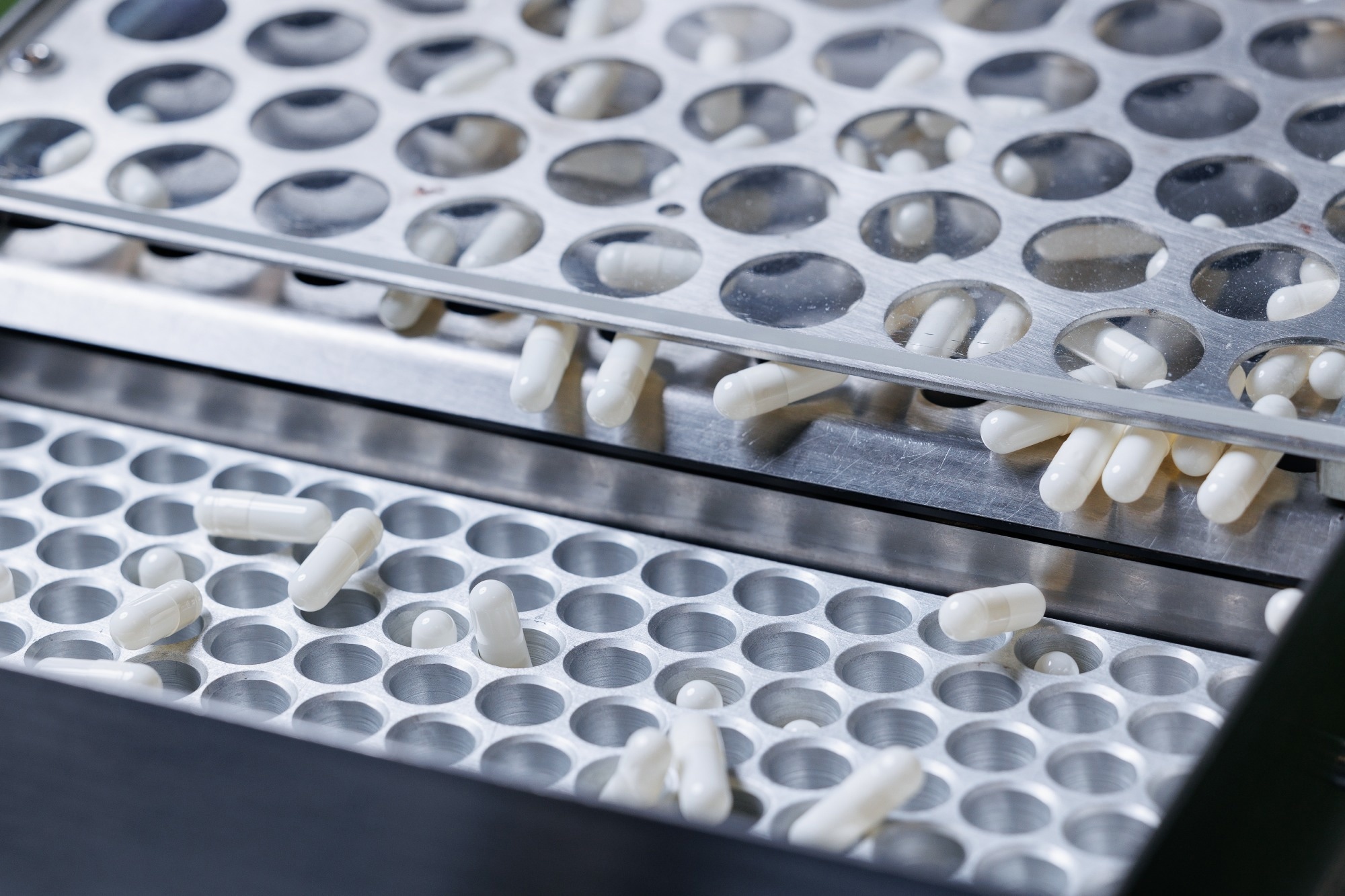 Pills being manufactured.