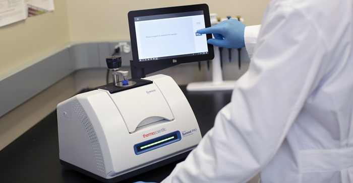 A scientist analyzing their findings on a PC.