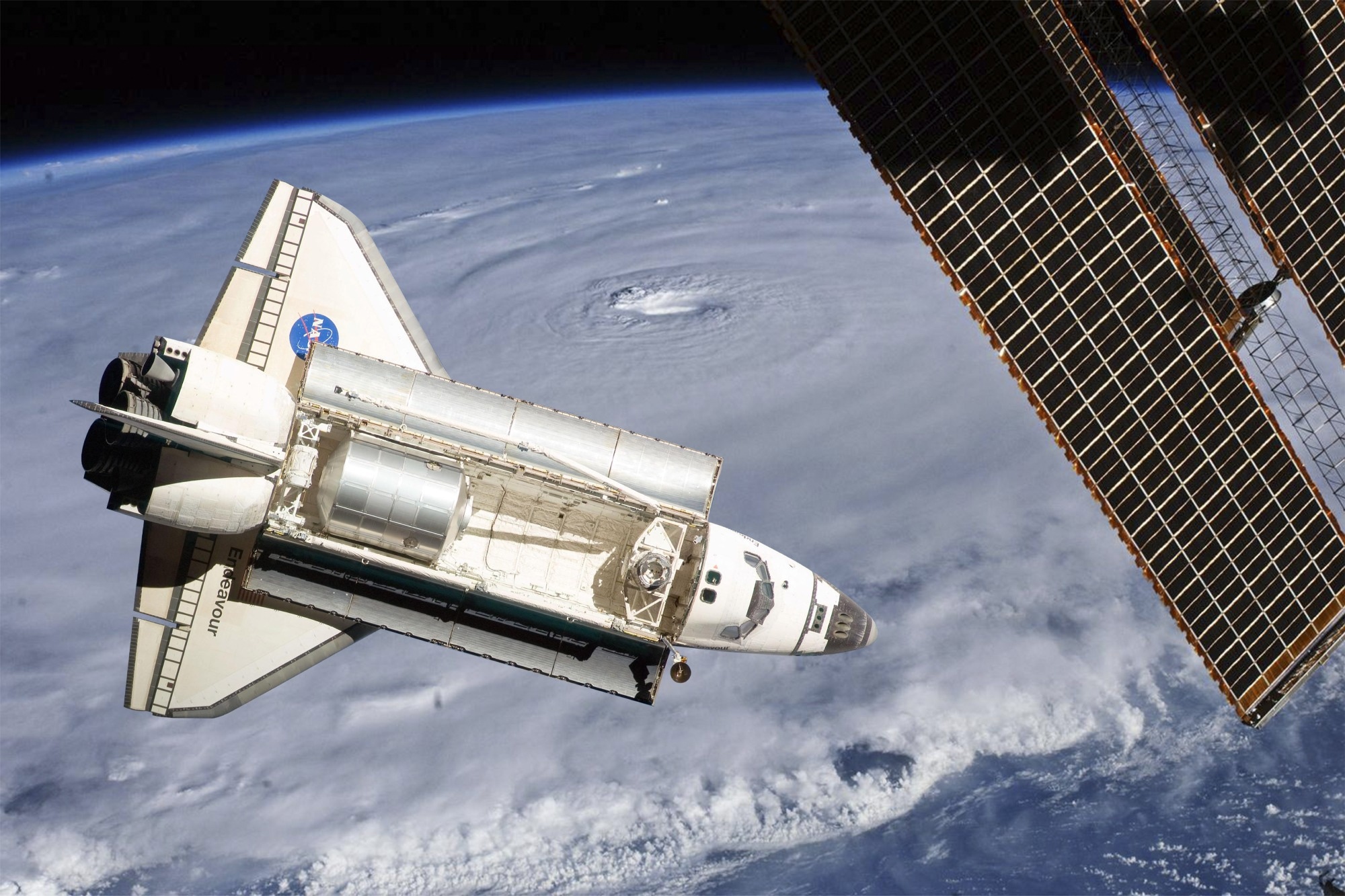 Space shuttle from a distance and satellite against background of Earth.