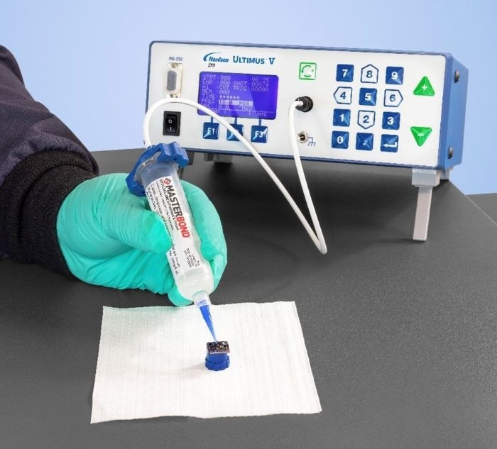 The Ultimus V fluid dispensing solution being applied to the sensor device.