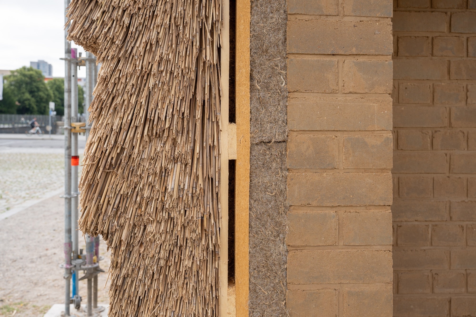 Section through the Straw-thatched Mudbrick exterior wall of a green building