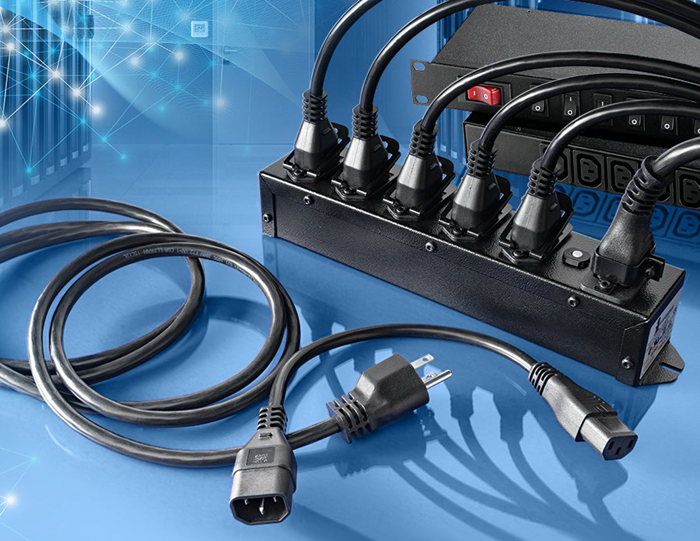 Various plugs in an extension power lead.