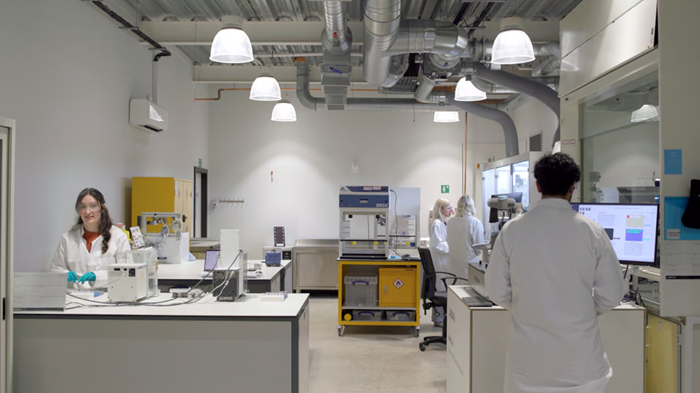The Labman team is seen in an open lab setting.