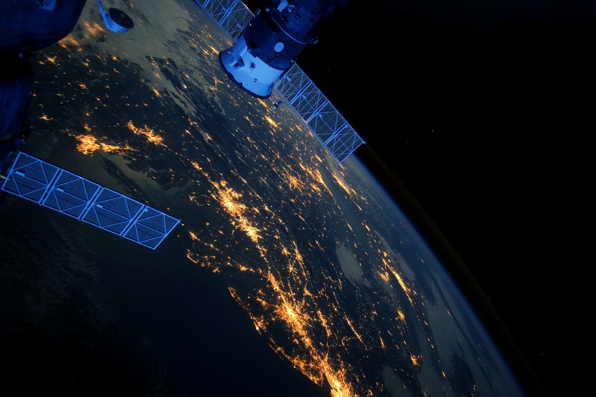 Image of a satellite above earth.