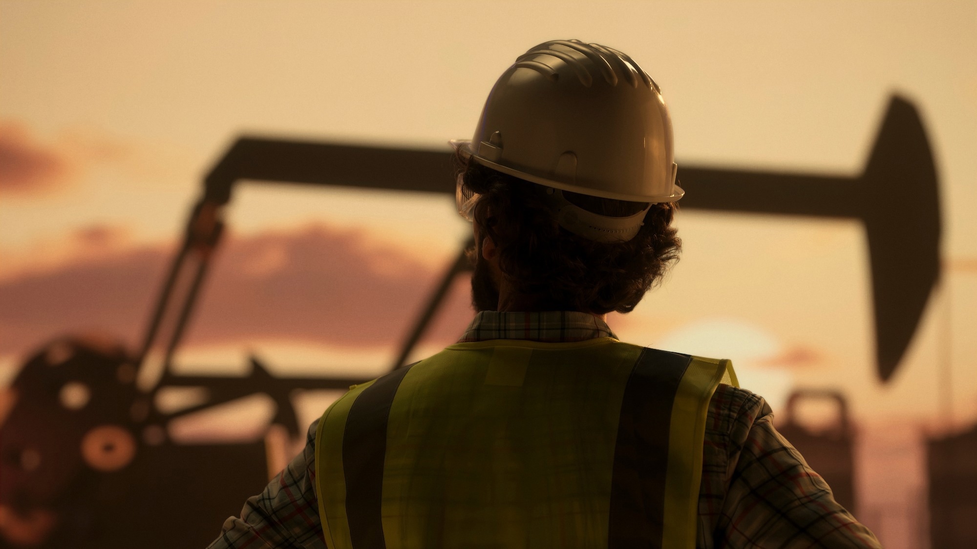 Oil engineer wearing a safety helmet