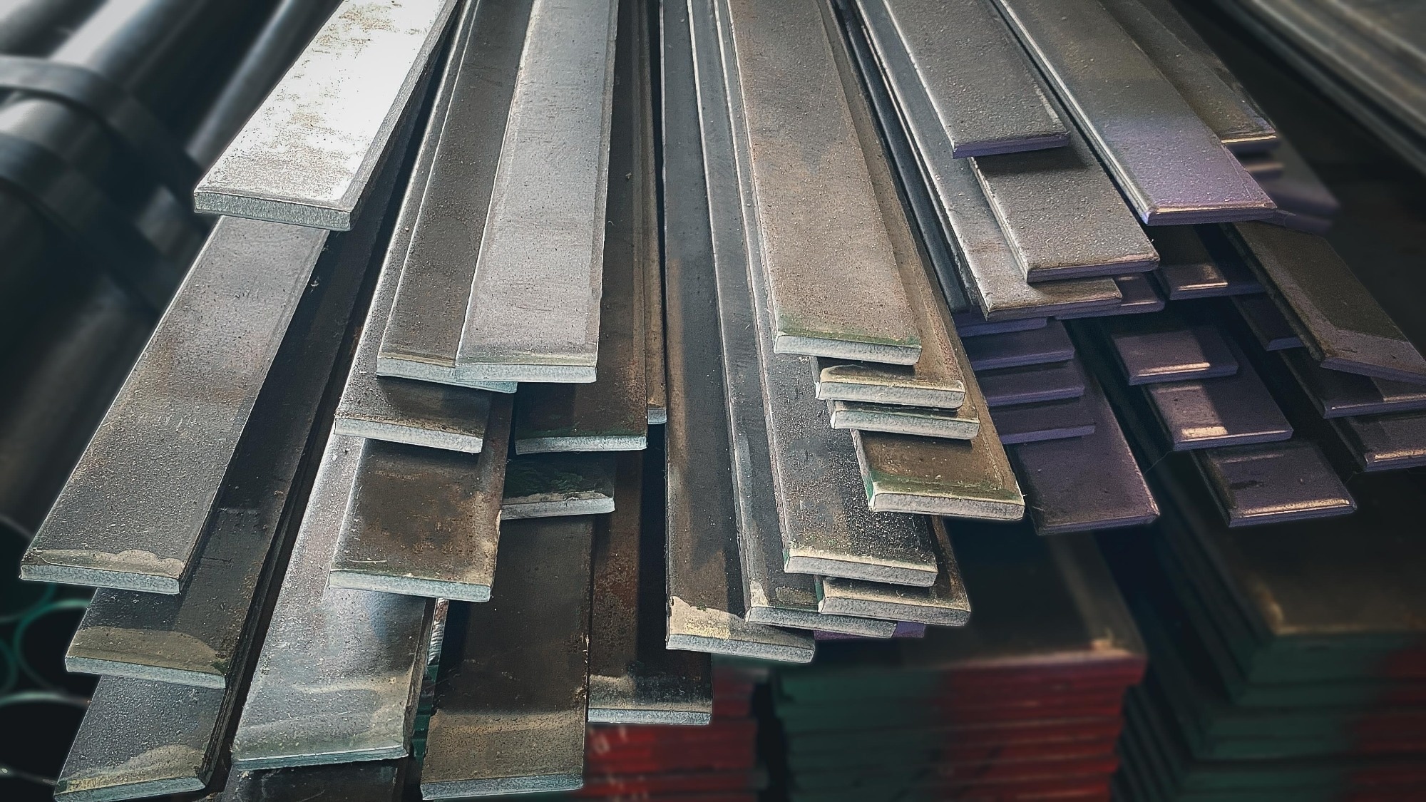 Stack of stainless steel flat bars for construction