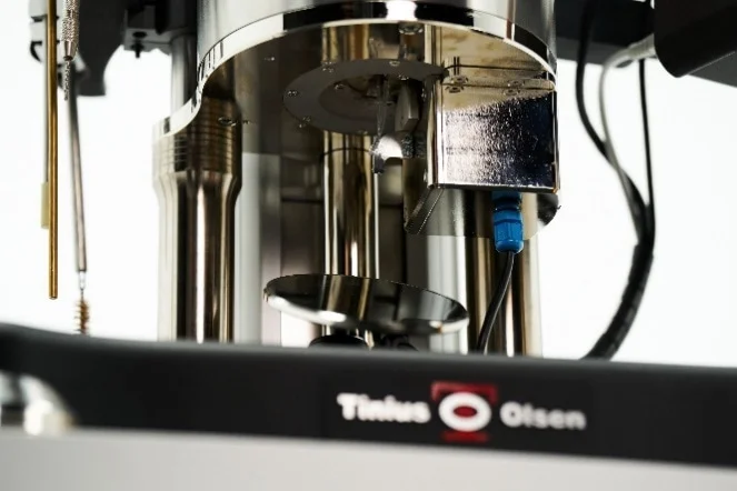 Users are finding ease-of-use features, like the MP1500’s automatic cut-off tool, in digital MFI systems equally as important as data-focused advancements. (pic. in standby mode awaiting sample from barrel)