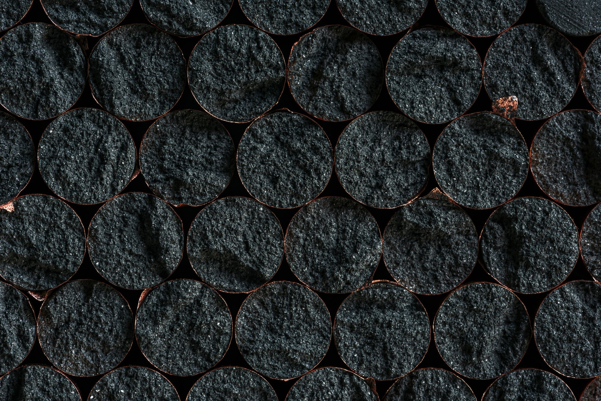 Graphite cores surrounded by a layer of copper