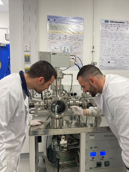 Two male scientists working in a lab