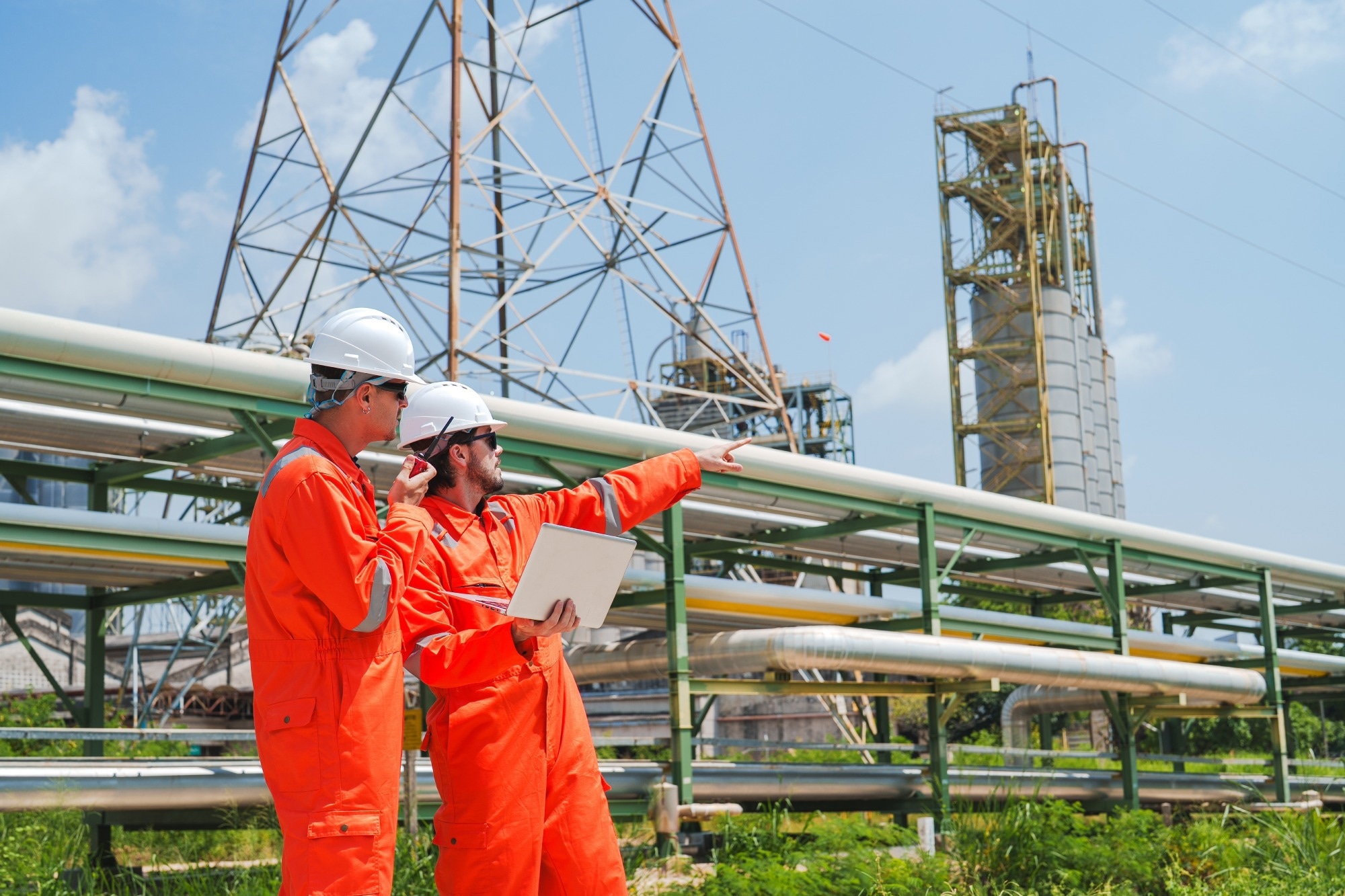Two engineers at an oil and gas facility
