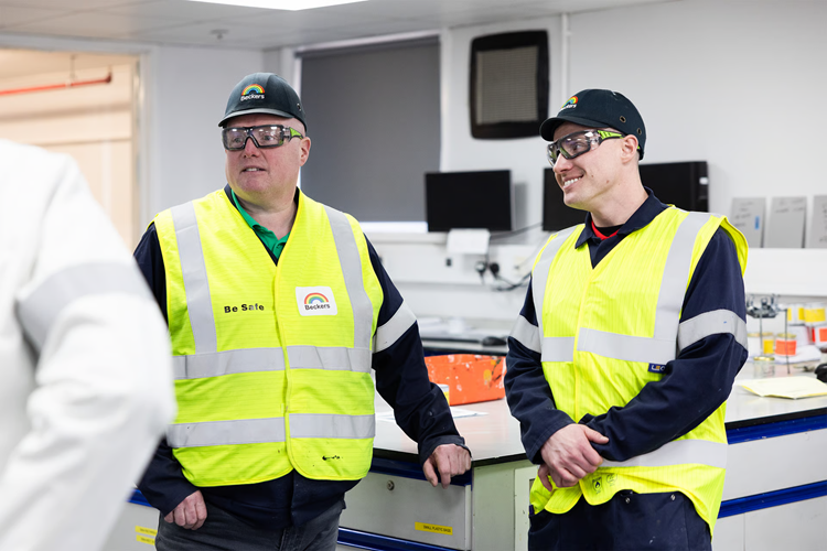 Two Beckers workers in conversation