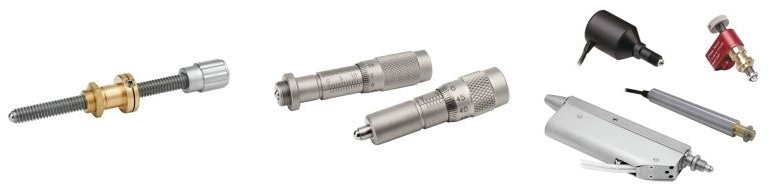 Various types of actuators including a manual actuator (left), a micrometer (middle), and motorized actuators (right)