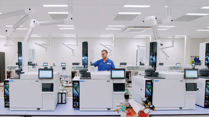Scientist using gasoline analysis equipment