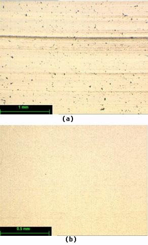 AZoJomo - The AZO Journal of Materials Online - Surface appearance of Spectrosil 2000 a) resin bond diamond wheel, b) cast iron bond diamond wheel with ELID(over 30 times higher material removal rate compared with Fig.13a).