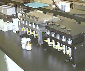 Multi-station RFS sample preparation fixture