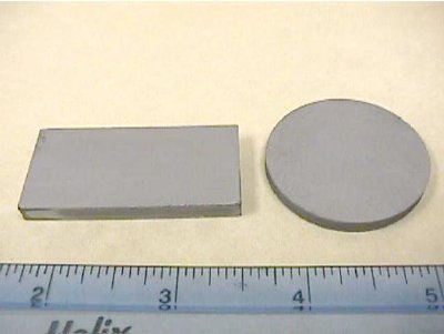Image showing rectangular and circular plates prepared by pressureless sintering or ZrB2 powders.