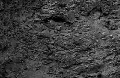 Uncoated Perowskite rock seen with conventional Rutherford back-scattering electrons at 12 kV