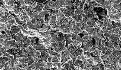 SEM image of brittle fracture near a fracture origin.