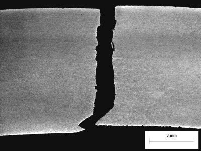 Transverse matched-fracture metallographic section at a fracture origin.
