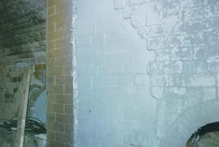 Tunnel kiln preheat section (right 2/3 of photo) after application of high emissivity coating. The textural differences between the new and used refractory brick surfaces are obvious.