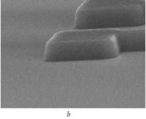 SEM photographs of RIE-etched p-doped polysilicon structures using HBr/Cl2 mixture. a. Overetch for two minutes.  b. Overetch for six minutes