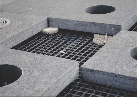 DURAGRATE® I-K2" square mesh by I-K2" thick molded grating coupled with EXTREN® Series 525 wide flange beams as support