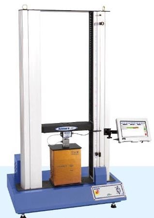 Crush test on cardboard packaging using a Multi Test 10i top-load tester.