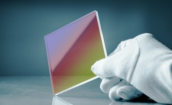 Understanding Photo-Structural Changes in Laser Processed Glass